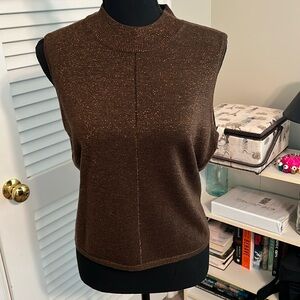 Paige sleeveless sweater size L.